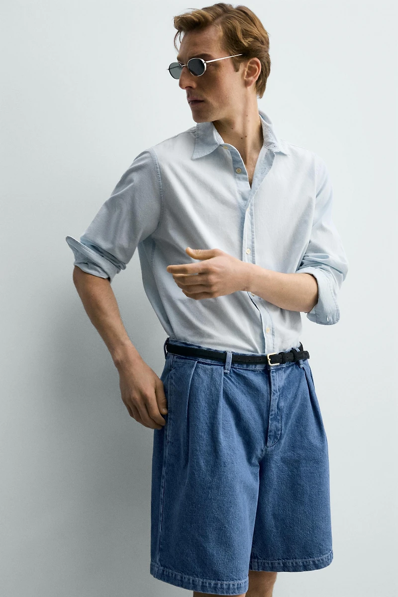 RELAXED FIT PLEATED DENIM SHORTS