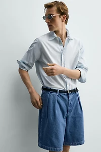 RELAXED FIT PLEATED DENIM SHORTS