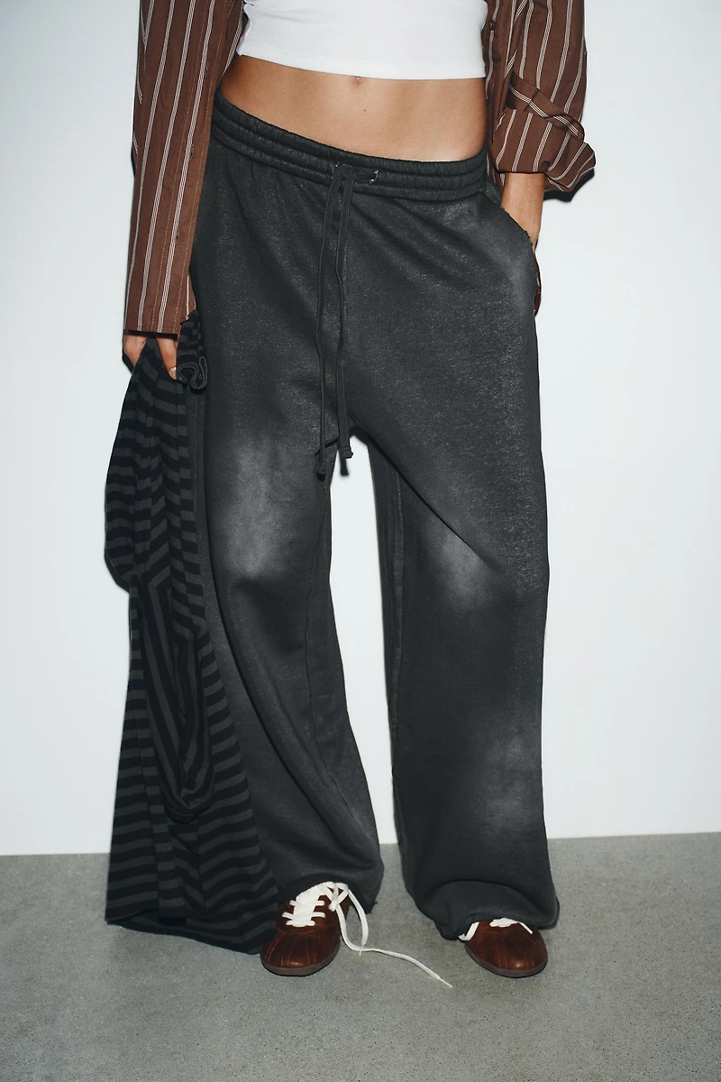 WASHED EFFECT RIPPED FLEECE PANTS