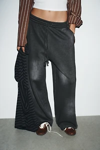 WASHED EFFECT RIPPED FLEECE PANTS