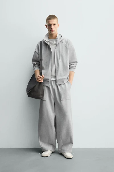 PANTALON DE JOGGING COUPE BALLON AVEC PIÈCE