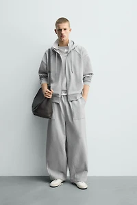 PANTALON DE JOGGING COUPE BALLON AVEC PIÈCE