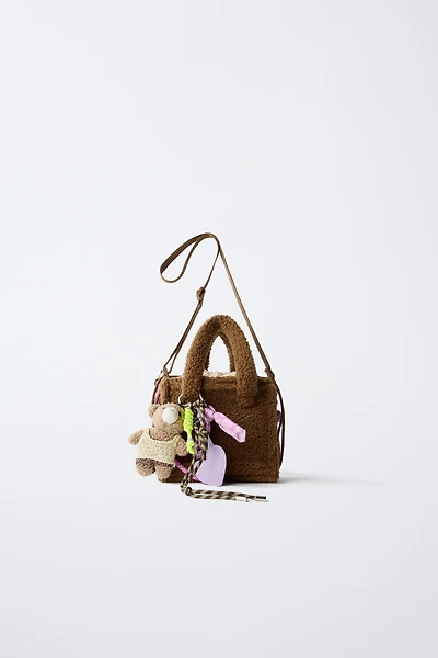 FLEECE CHARM CROSSBODY BAG