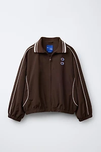 BLOUSON NYLON AVEC SAC CHAMPION ® X ZARA