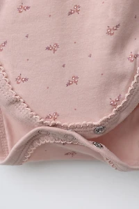 THREE-PACK OF KIMONO COLLAR FLORAL BODYSUITS