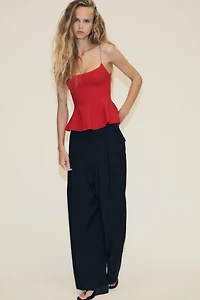 STRETCH PEPLUM TOP
