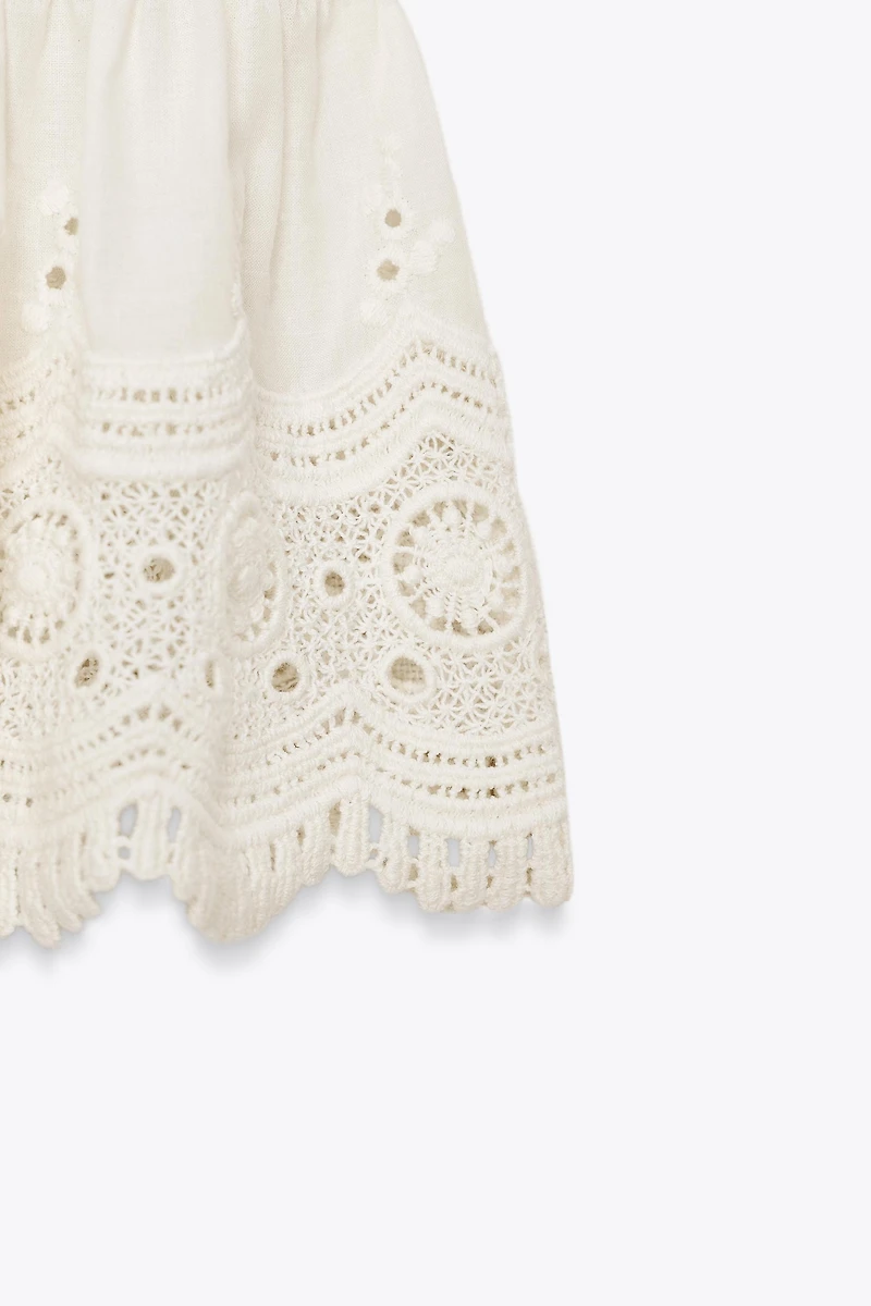 TOP ROMANTIQUE EN MAILLE BIMATIÈRE