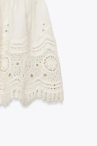 TOP ROMANTIQUE EN MAILLE BIMATIÈRE