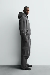 NEOPRENE EFFECT HOODIE SWEATSHIRT WITH PLEATS