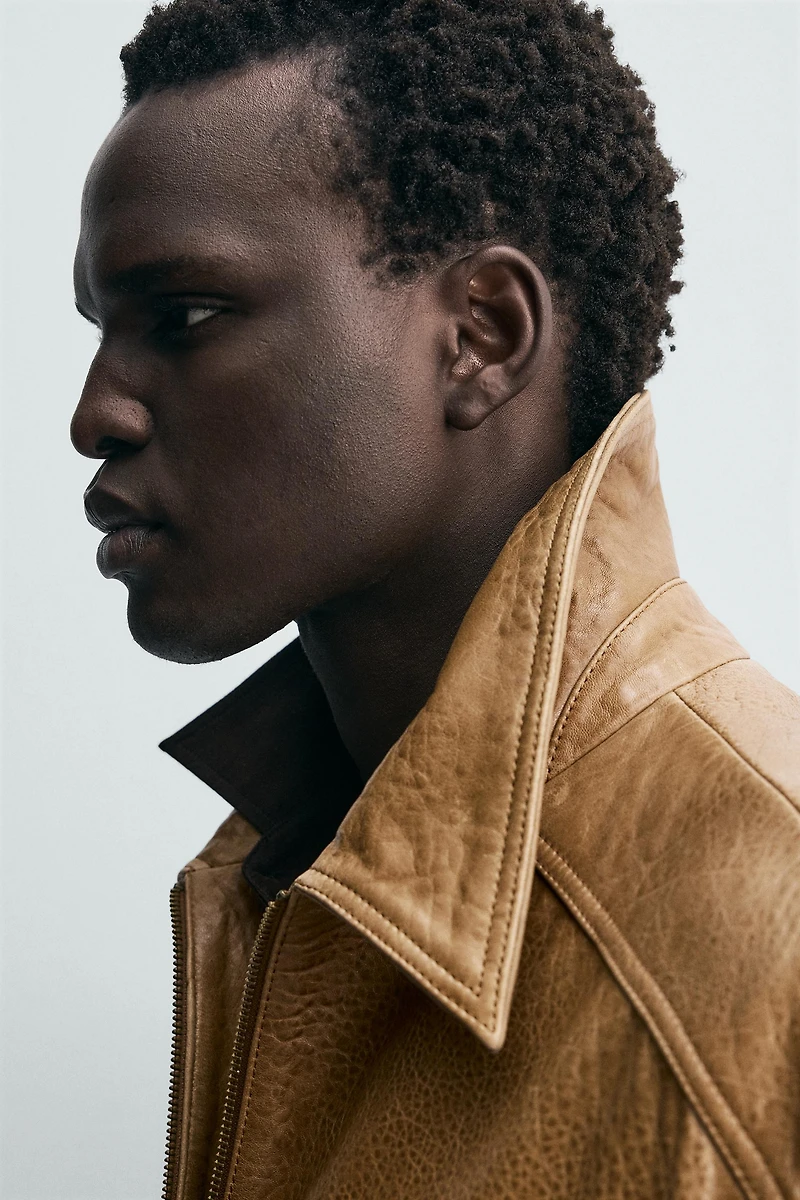 BLOUSON EN CUIR À POCHES