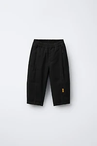 BALLOON PLEATED PANTS WITH LABELS