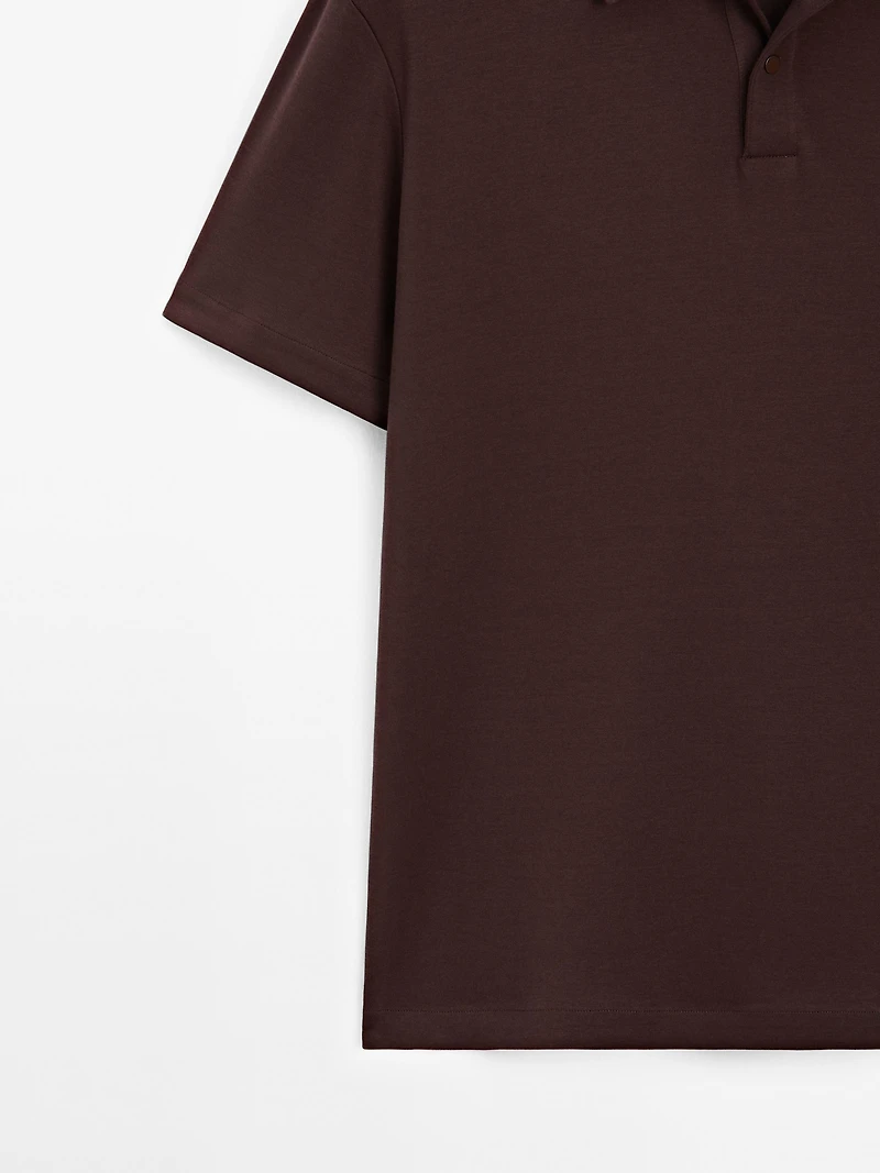 Short sleeve polo shirt with snap-button placket