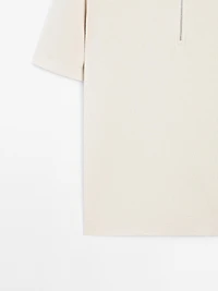 Polo en maille de coton à col zippé