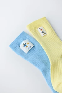 TWO-PACK OF MICKEY MOUSE AND DONALD DUCK LONG SOCKS © DISNEY