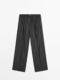 Darted pinstripe trousers