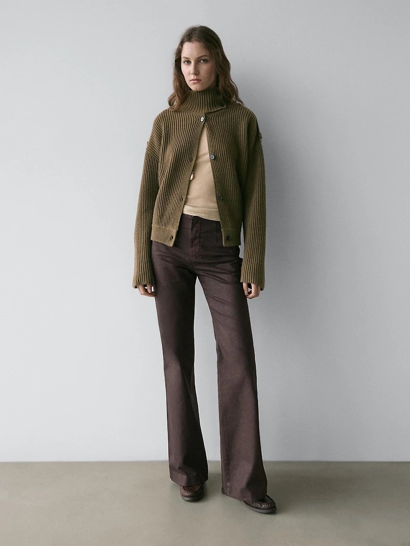 Waxed flare fit trousers