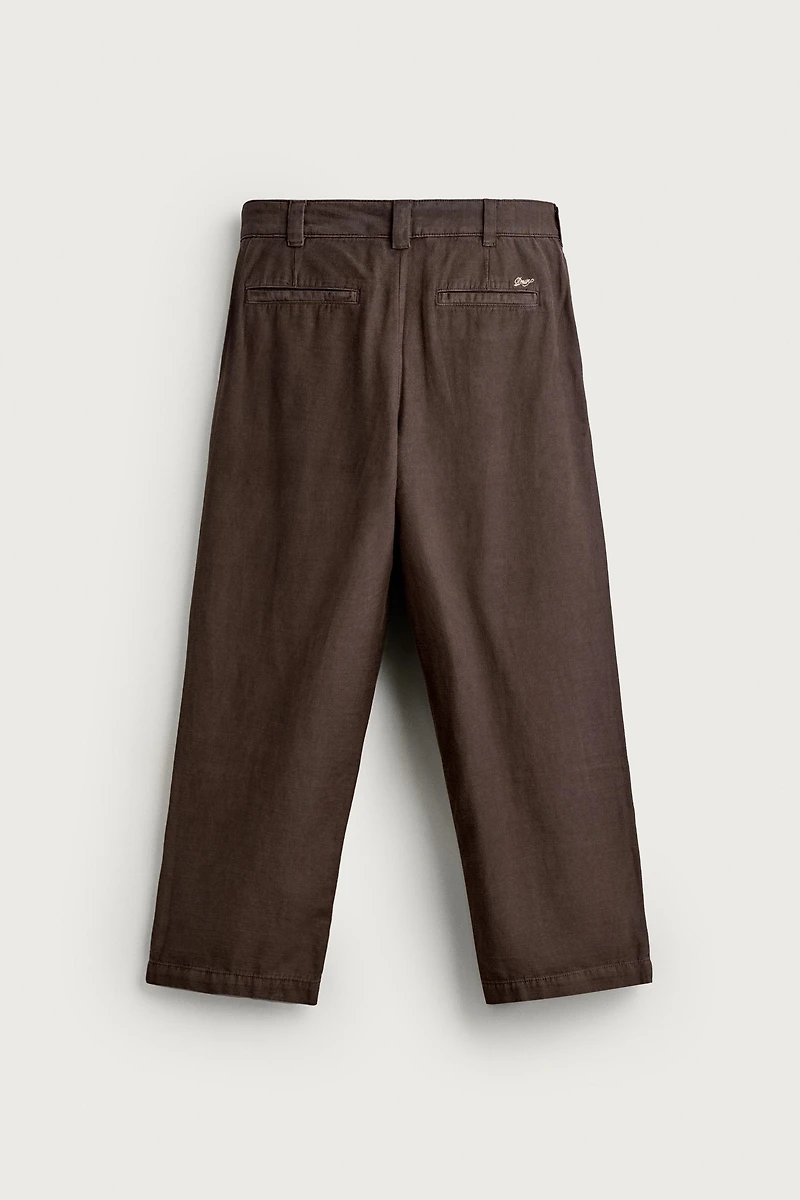 RELAXED FIT PLEATED CHINO PANTS