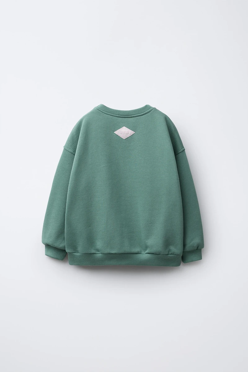 TERRY PATCH SWEATSHIRT