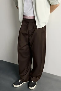 SIDE-PLEAT BALLOON FIT PANTS