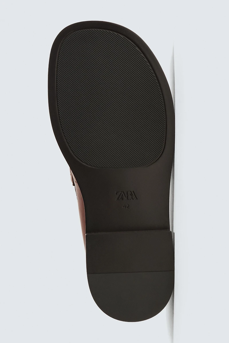 MOCASSINS EN CUIR AVEC MASQUE