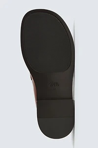 MOCASSINS EN CUIR AVEC MASQUE