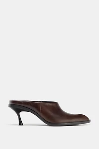 SABOTS EN CUIR AVEC CONTOUR