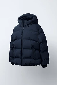 MANTEAU REMBOURRÉ ÉTIQUETTE DÉPERLANT