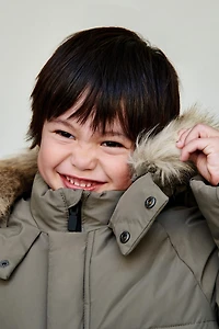 LONG DOWN FEATHER WATER REPELLENT AND WIND RESISTANT PUFFER COAT