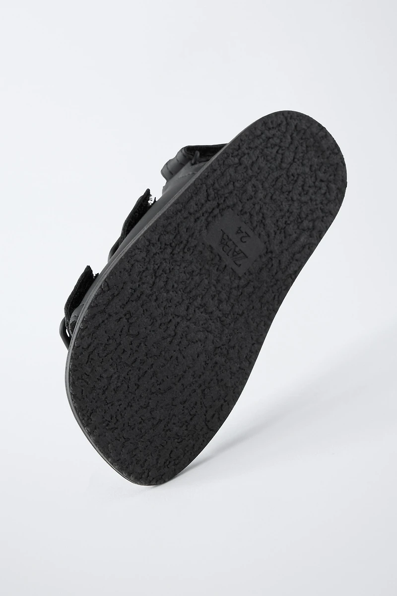BUCKLED SANDALS