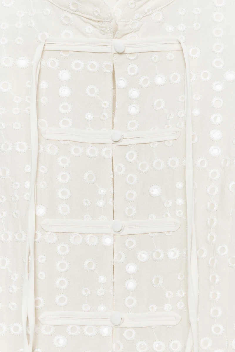 EMBROIDERED EYELET TOP WITH FROG FASTENING