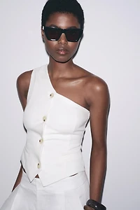TOP GILET ASYMÉTRIQUE INTERLOCK