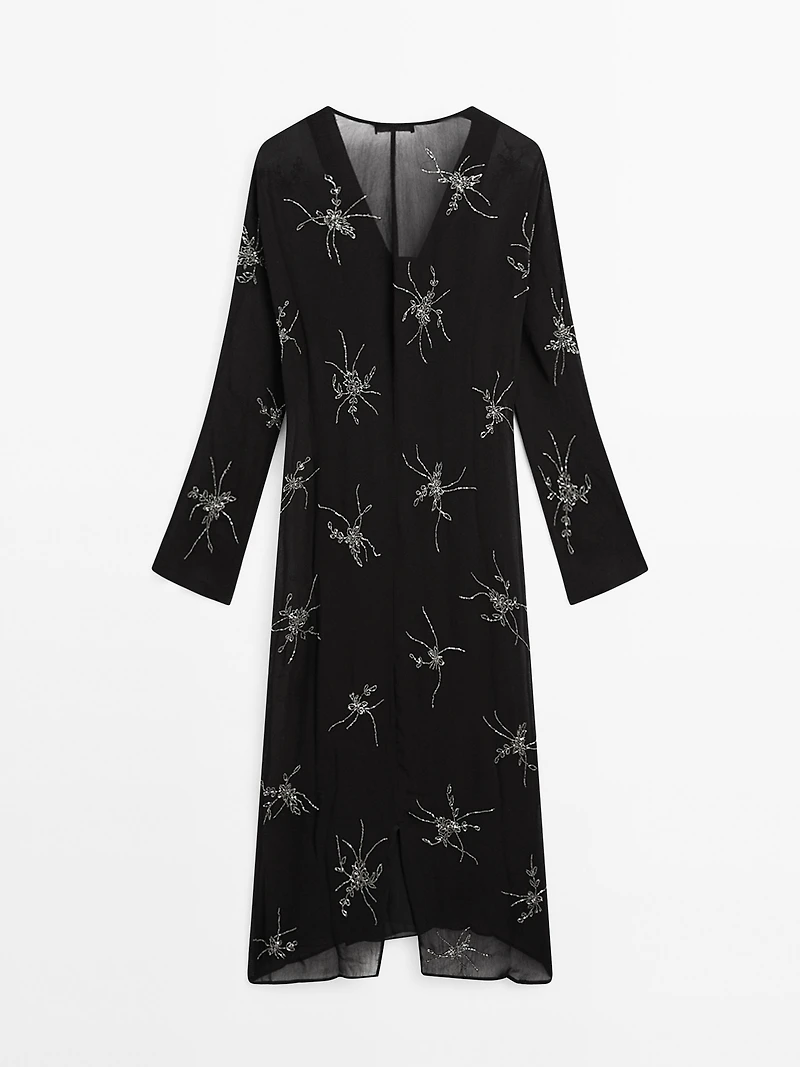 Flowing midi dress with embroidery
