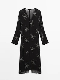 Flowing midi dress with embroidery
