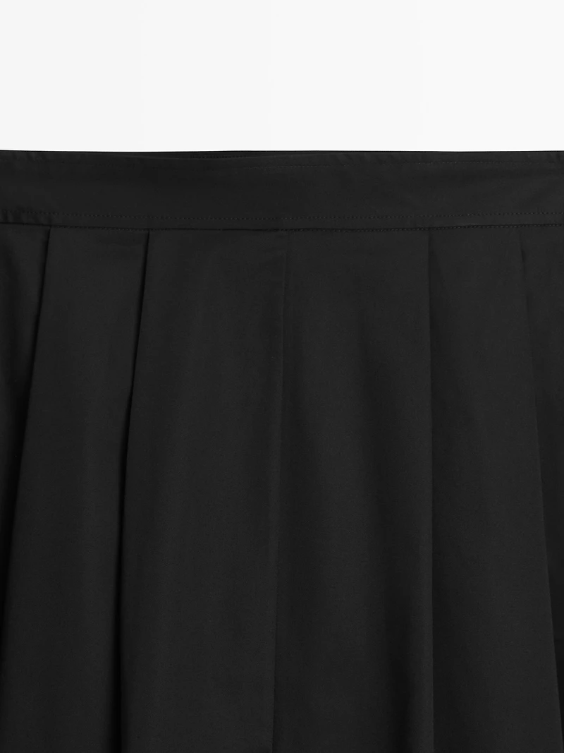 Midi skirt with box pleats