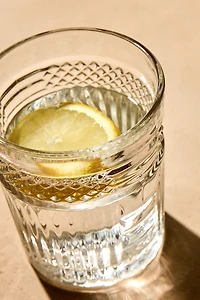 RAISED DESIGN GLASS TUMBLER