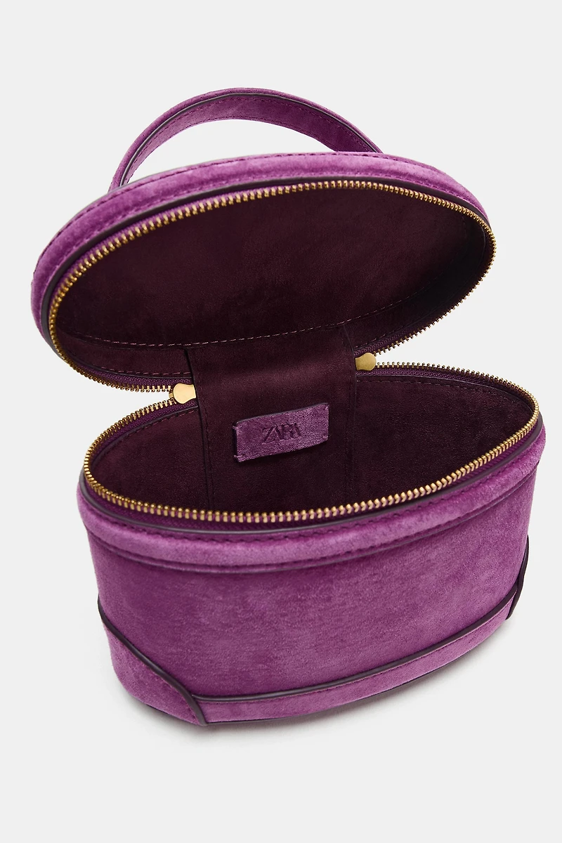 LEATHER VANITY BAG