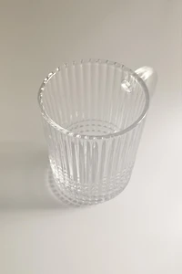 GLASS MUG WITH A RAISED GEOMETRIC DESIGN