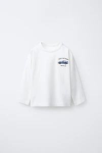 T-SHIRT AVEC APPLIQUÉ EN CAOUTCHOUC