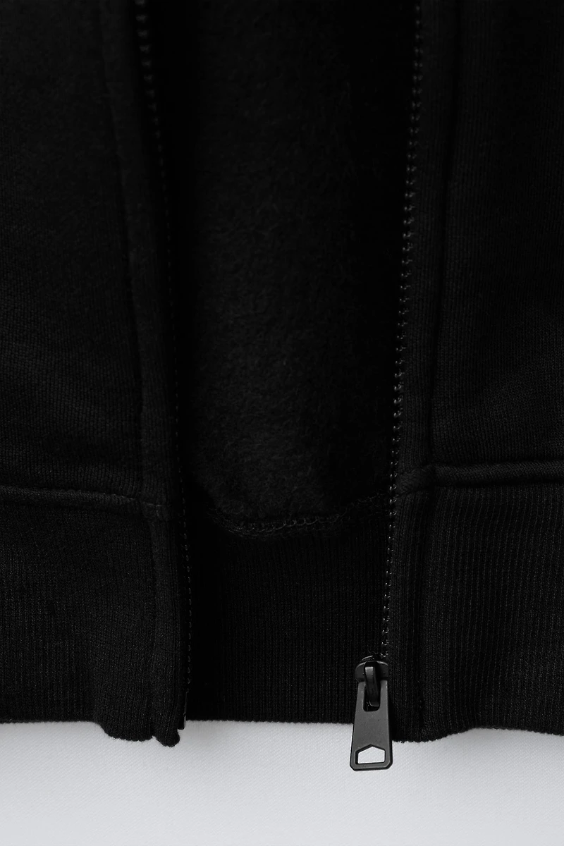 PLUSH ZIPPERED SWEATSHIRT