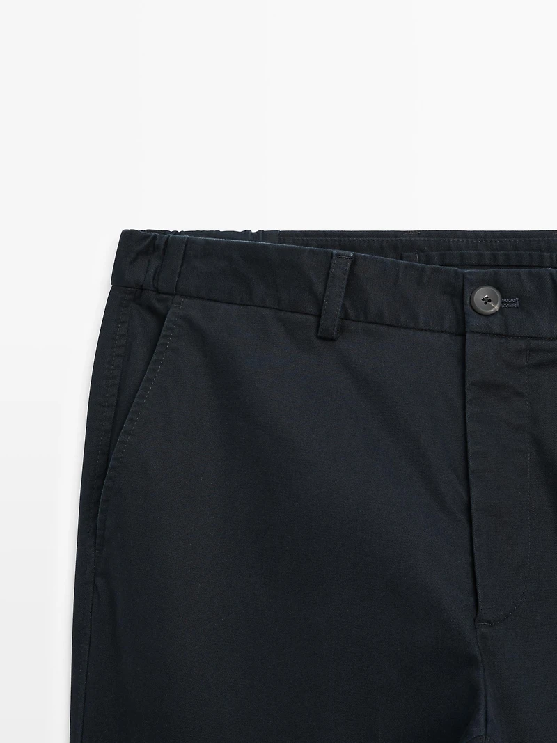 Slim fit trousers with elastic side detail
