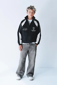 UEFA CHAMPIONS LEAGUE ® WATER REPELLENT JACKET WITH HOODIE