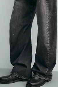 BARREL FIT JEANS WITH TWISTED SEAMS