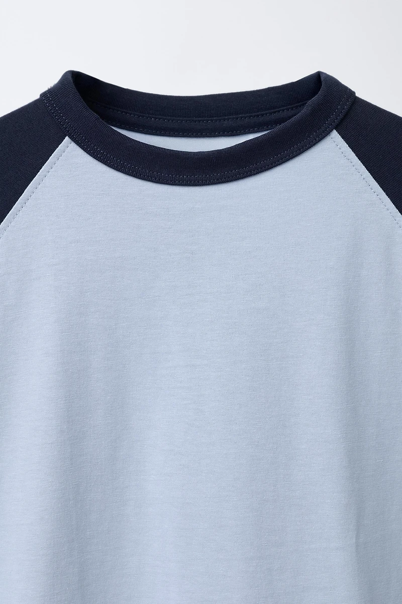 EMBROIDERED TEXT RAGLAN SLEEVE T-SHIRT