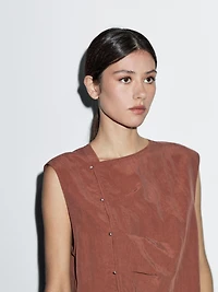 Blouse boutonnage côté argenté
