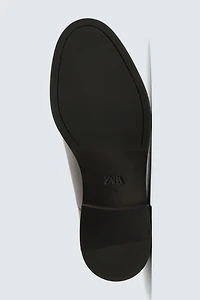 CHAUSSURES CHIC EN CUIR