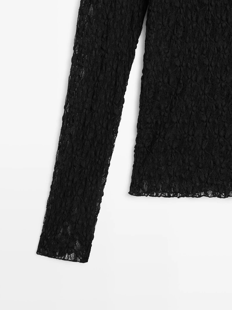 Top en maille de dentelle ajourée à manches longues