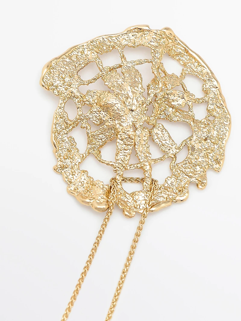 Necklace with lace piece pendant
