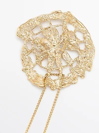 Necklace with lace piece pendant
