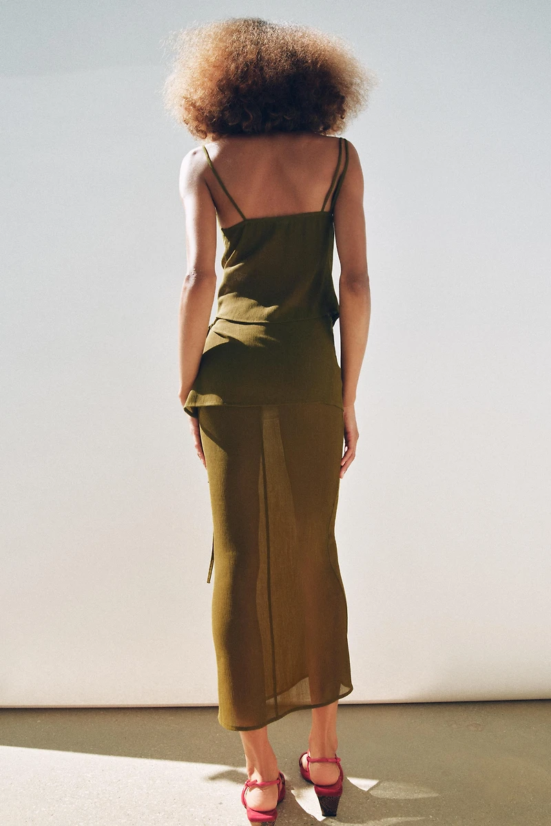TOP ASYMÉTRIQUE TEXTURÉ SEMI-TRANSPARENT