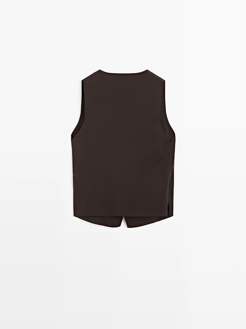 Veste sans manches en maille croisée avec nœud